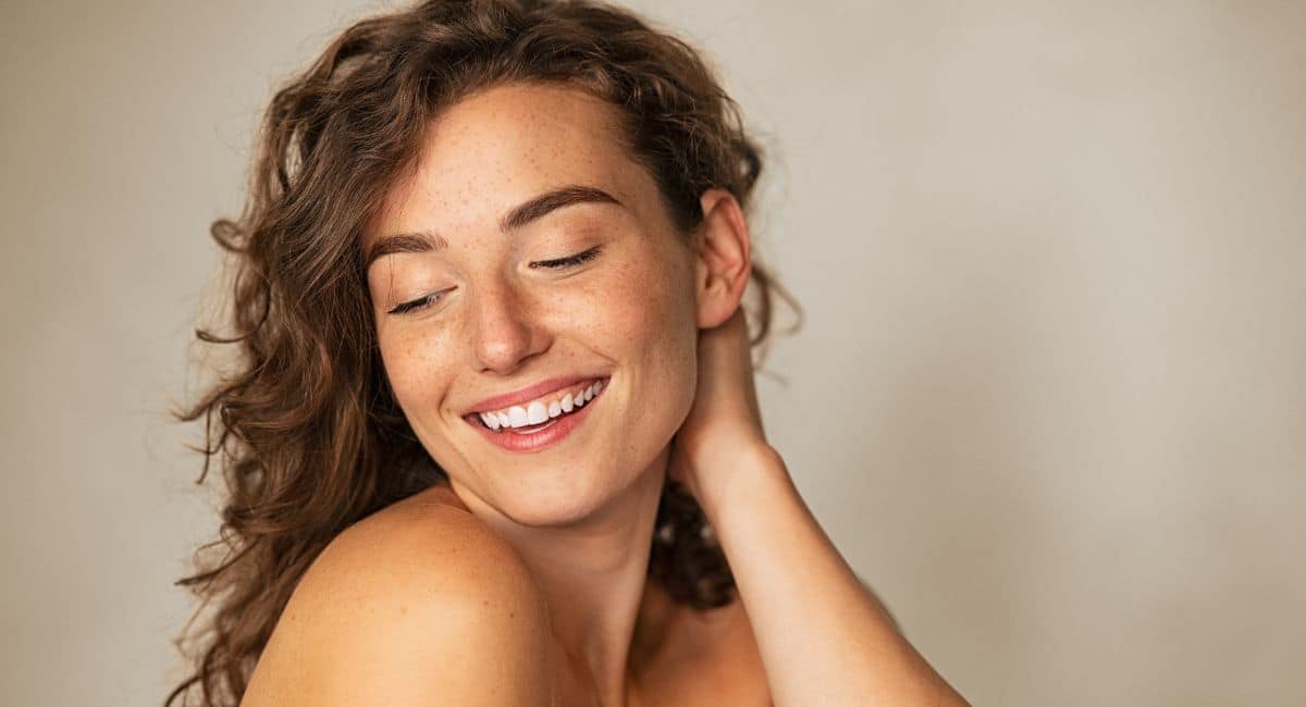 Woman smiling because of ultherapy cost and results.